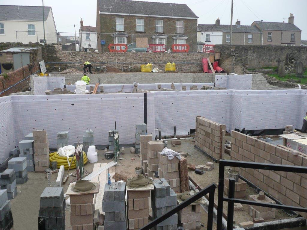 Waterproofing Retaining Walls on a Sloping Site.