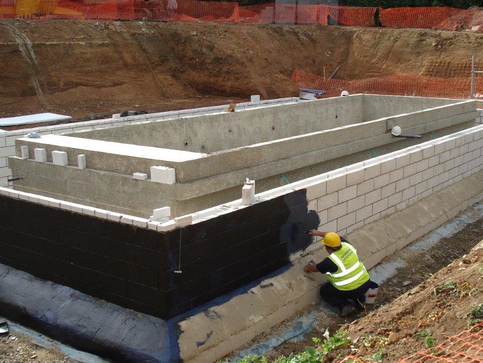 Protectahome Technician applying Type A (Barrier Protection) Liquid Membrane.